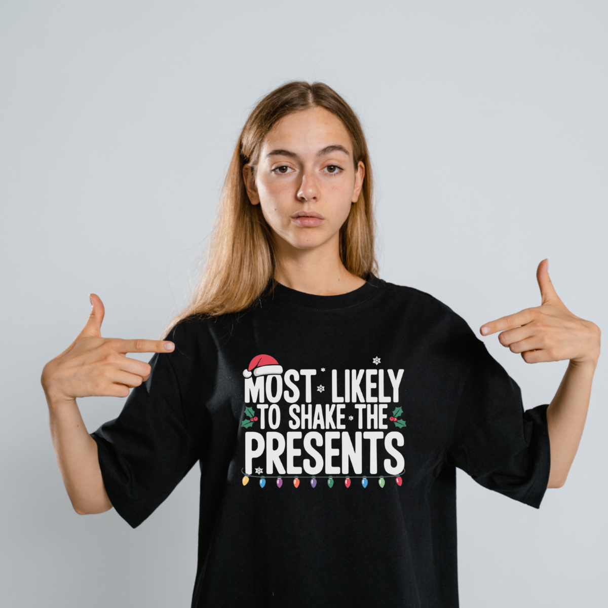 Most Likely to Shake the Presents Tee